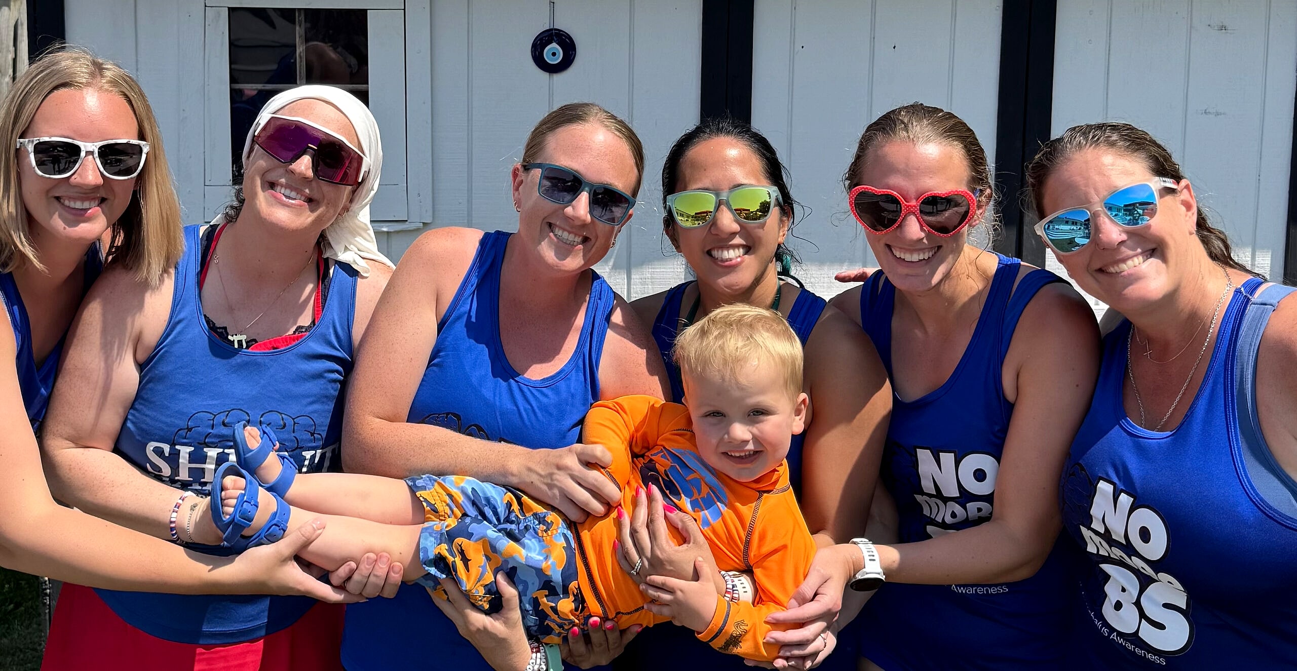 HA Endurance Team runners in matching blue tank tops